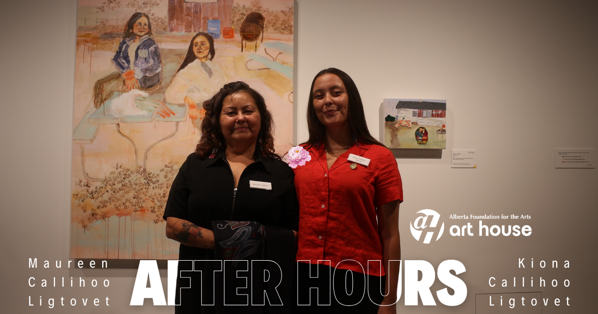 Maureen Callihoo and Kiona Callihoo Ligtvoet stand together in front of their artworks. Maureen is wearing a black shirt while Kiona is wearing a red shirt.